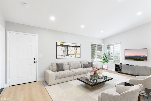 living room with lofted ceiling, baseboards, wood finished floors, and recessed lighting