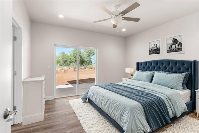 bedroom featuring access to exterior, recessed lighting, ceiling fan, wood finished floors, and baseboards