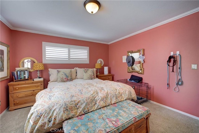 bedroom featuring crown molding, baseboards, and carpet floors