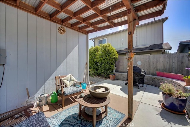 view of patio / terrace with fence