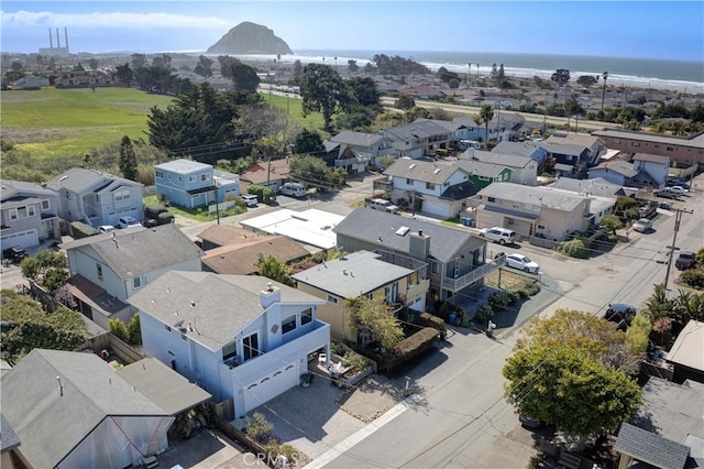 birds eye view of property featuring a residential view and a water view