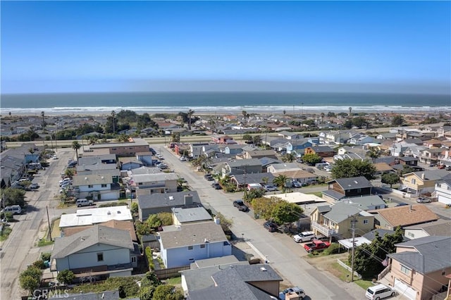 bird's eye view with a water view and a residential view