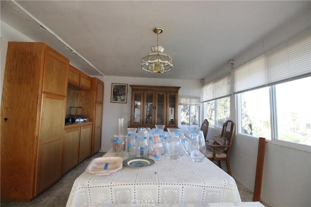 dining area featuring a chandelier