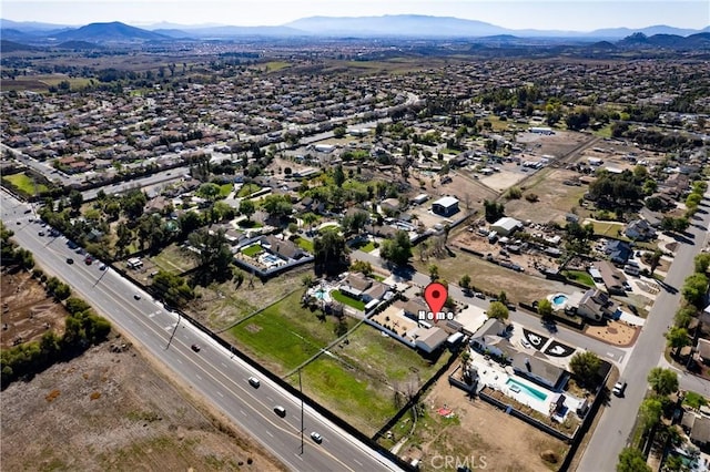 bird's eye view with a mountain view