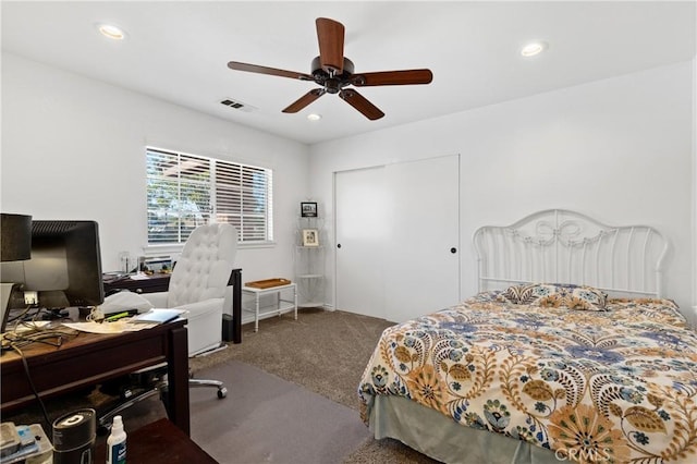 carpeted bedroom featuring recessed lighting, visible vents, a closet, and ceiling fan