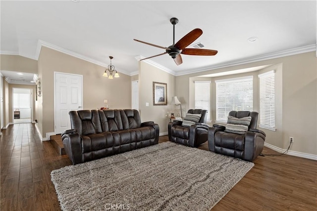 living area featuring ceiling fan with notable chandelier, crown molding, and dark wood-type flooring