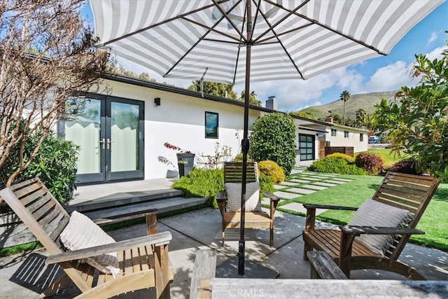 view of patio / terrace featuring french doors