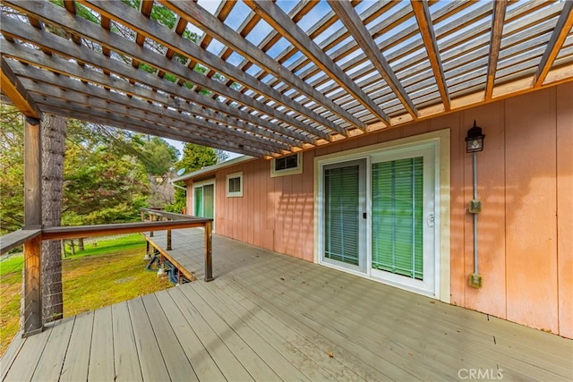 wooden deck featuring a pergola