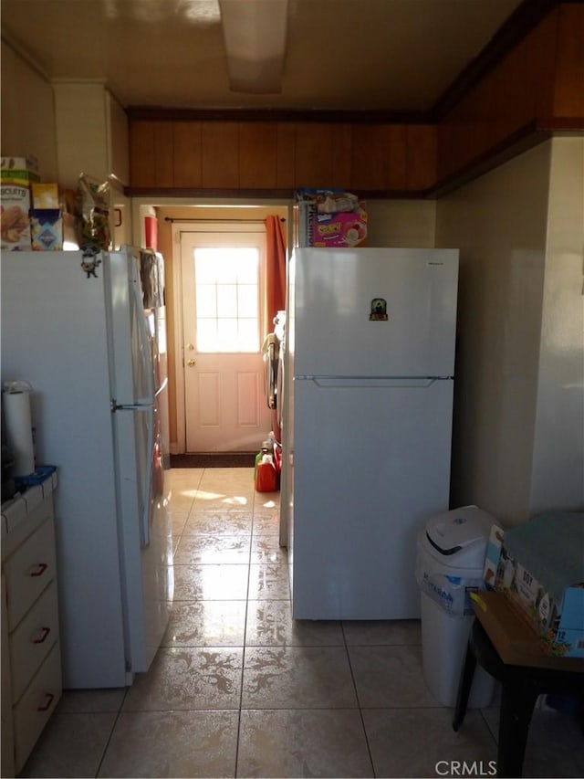 kitchen with freestanding refrigerator