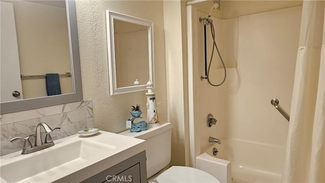 full bath featuring vanity, shower / bathtub combination with curtain, decorative backsplash, toilet, and a textured wall