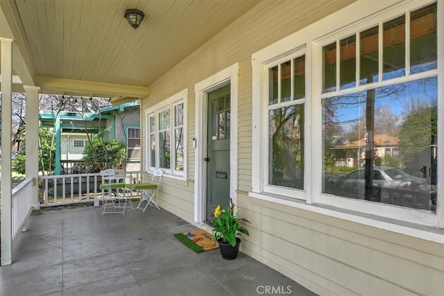 view of patio featuring a porch