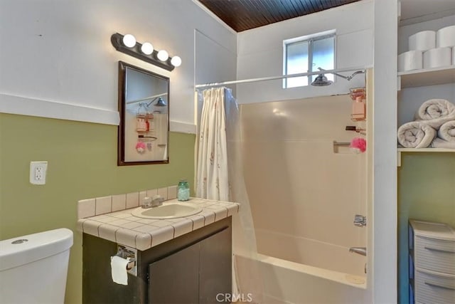 full bathroom featuring toilet, vanity, and shower / bath combo