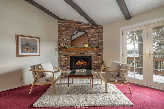 living area featuring lofted ceiling with beams, carpet floors, and a wealth of natural light