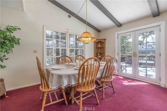 dining room with carpet floors, french doors, vaulted ceiling with beams, a textured ceiling, and baseboards