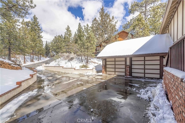 view of snow covered patio