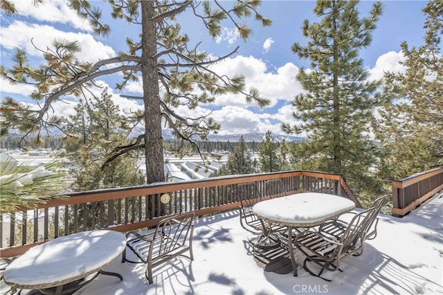 view of snow covered deck