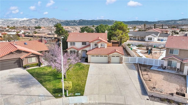 aerial view featuring a residential view and a mountain view