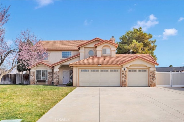 mediterranean / spanish-style house featuring a front lawn, a chimney, an attached garage, and fence