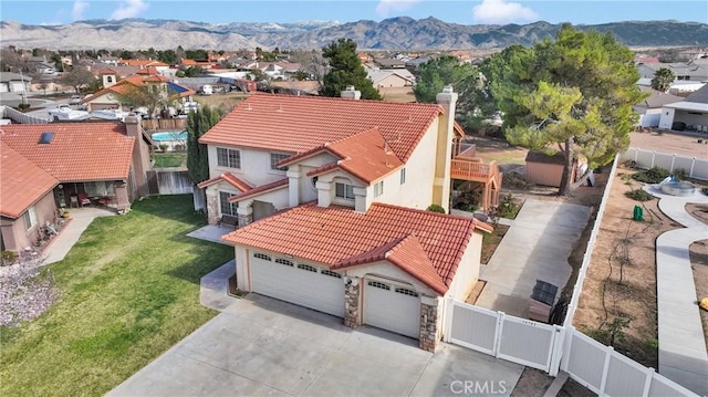 aerial view with a residential view and a mountain view