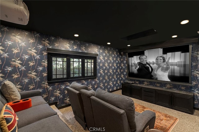 carpeted cinema room with wallpapered walls and recessed lighting