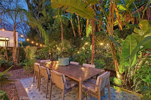 view of patio featuring outdoor dining area