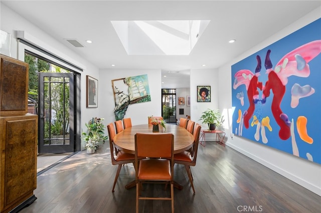 dining area featuring visible vents, recessed lighting, and wood finished floors