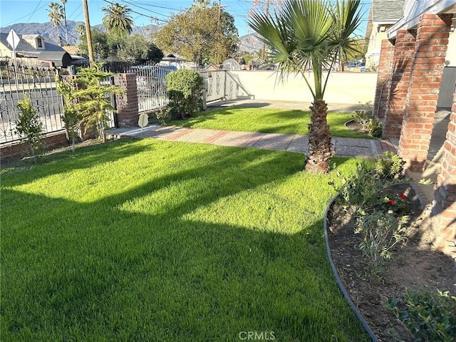 view of yard featuring fence