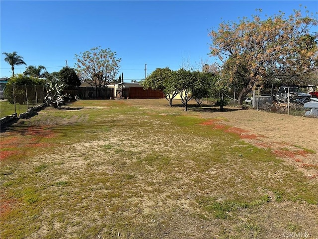 view of yard with fence