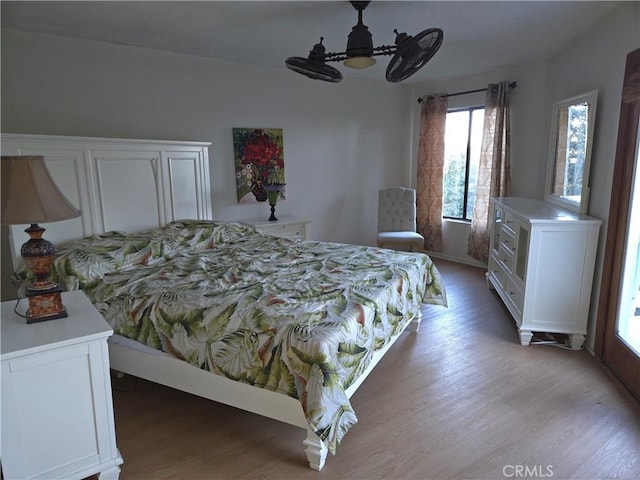 bedroom featuring light wood-style floors