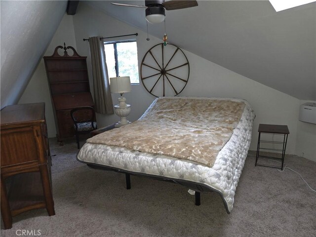 bedroom featuring carpet flooring and vaulted ceiling