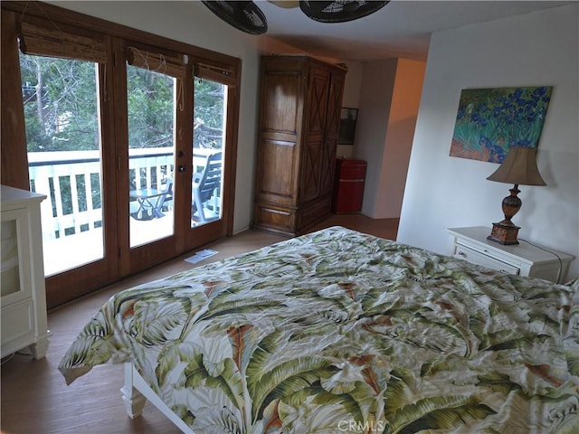 bedroom featuring french doors, visible vents, and access to exterior