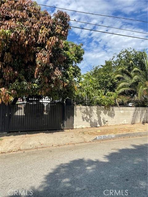 view of yard with a gate and fence