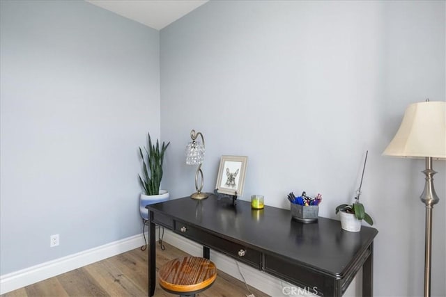 office area featuring wood finished floors and baseboards