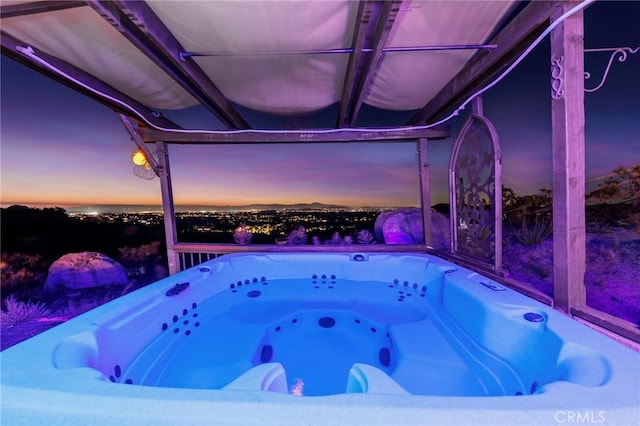 view of pool featuring a hot tub