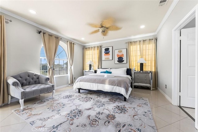 bedroom featuring light tile patterned floors, baseboards, visible vents, and crown molding