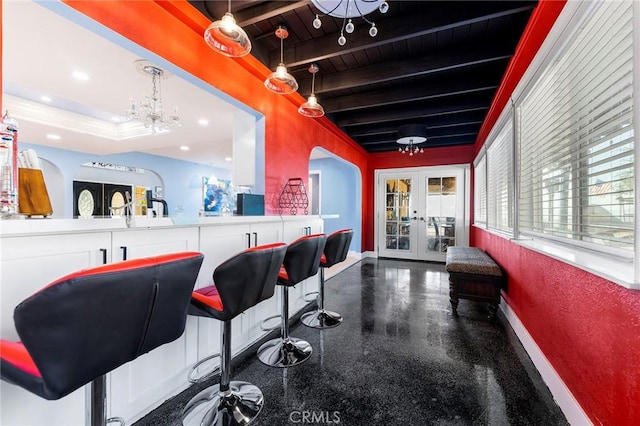 bar with arched walkways, french doors, recessed lighting, beamed ceiling, and baseboards