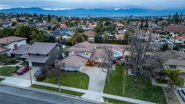 aerial view with a residential view and a mountain view