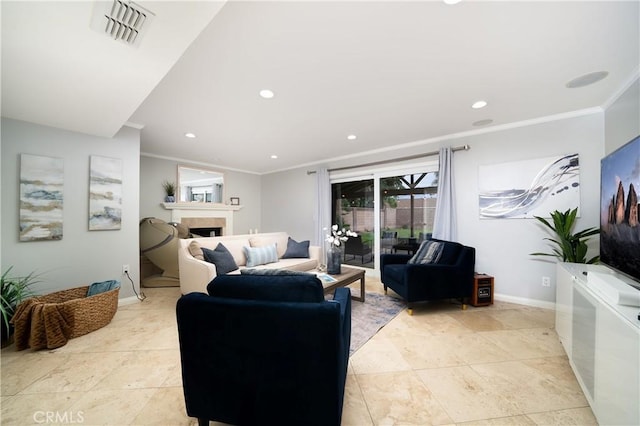 living area featuring visible vents, recessed lighting, a fireplace, crown molding, and baseboards