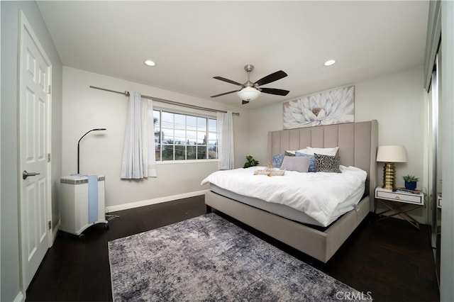 bedroom featuring recessed lighting, a ceiling fan, baseboards, and wood finished floors