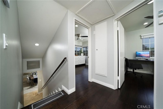 corridor with visible vents, an upstairs landing, recessed lighting, wood-type flooring, and baseboards