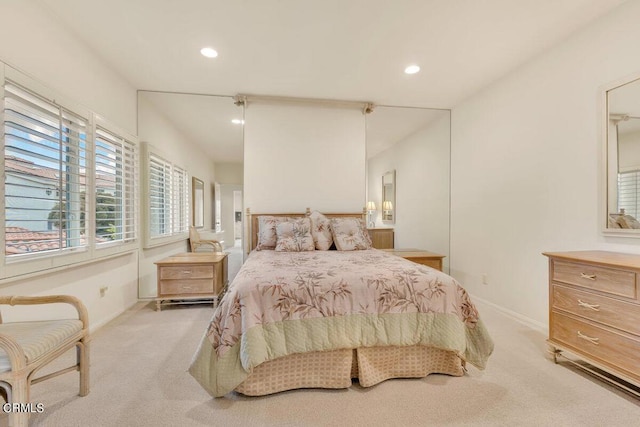 bedroom with recessed lighting, carpet flooring, and baseboards