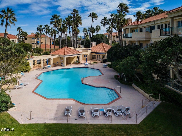 community pool featuring a patio