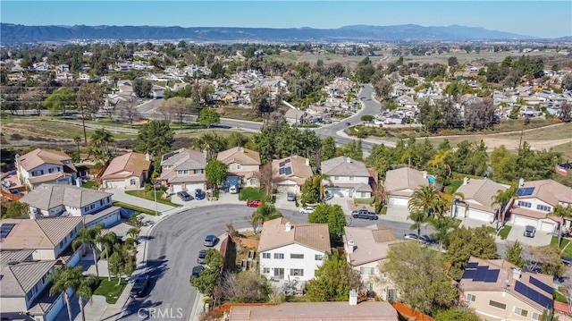 bird's eye view with a mountain view and a residential view