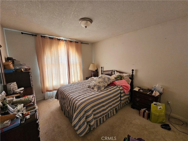 carpeted bedroom with a textured ceiling