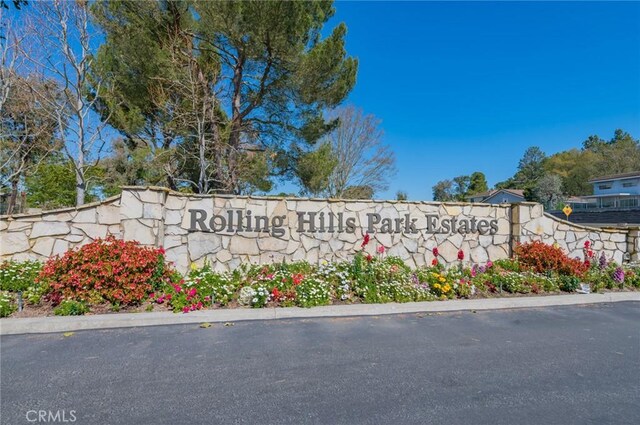 view of community sign