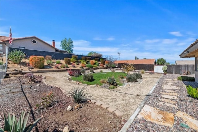 view of yard with fence