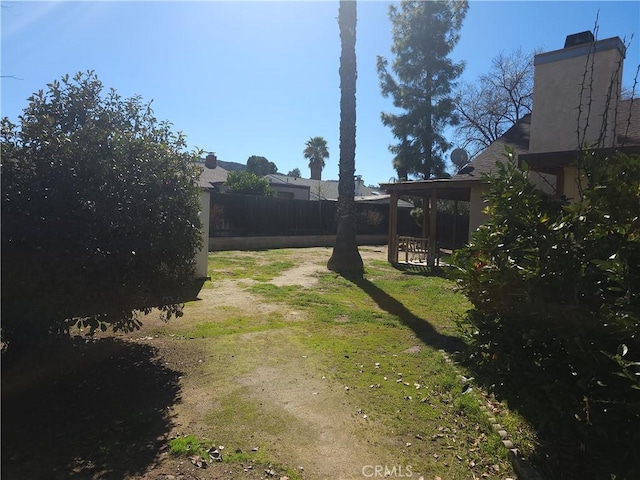 view of yard with fence