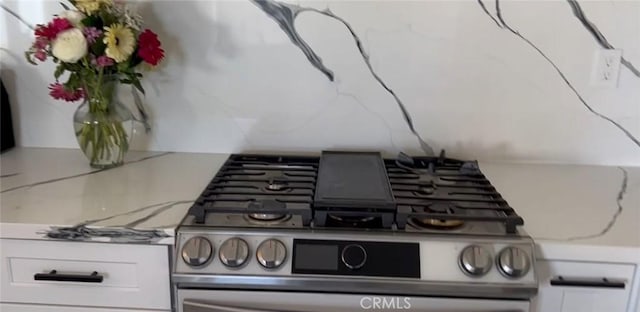 26734 Caravan Cir, Corona, CA 92883 - kitchen view of stainless steel gas stove and light stone counters