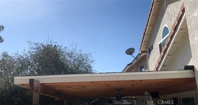 26734 Caravan Cir, Corona, CA 92883 - exterior view of stucco siding, a ceiling fan, and a satellite dish