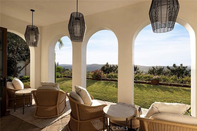 view of patio / terrace with a mountain view